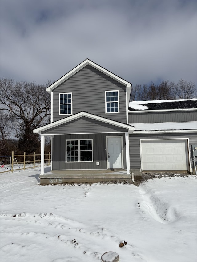 view of front of home with a garage