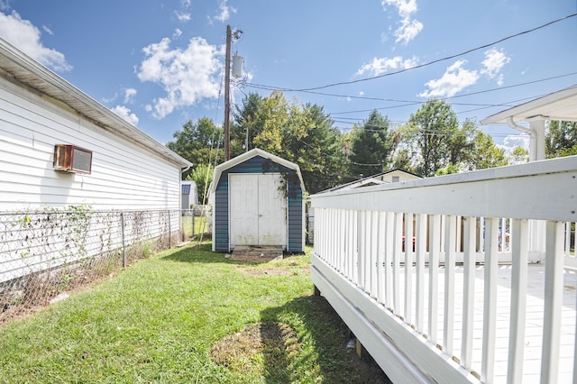 view of yard featuring a storage unit and an outdoor structure