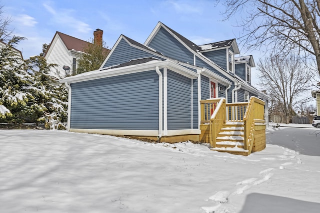 view of snow covered property