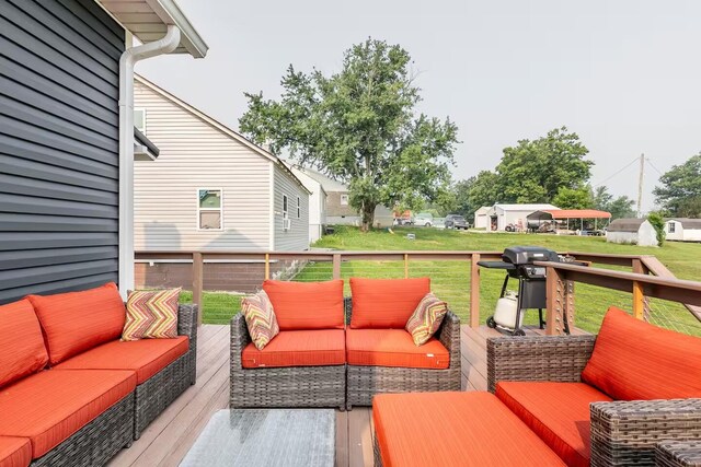 wooden terrace with central air condition unit and outdoor lounge area