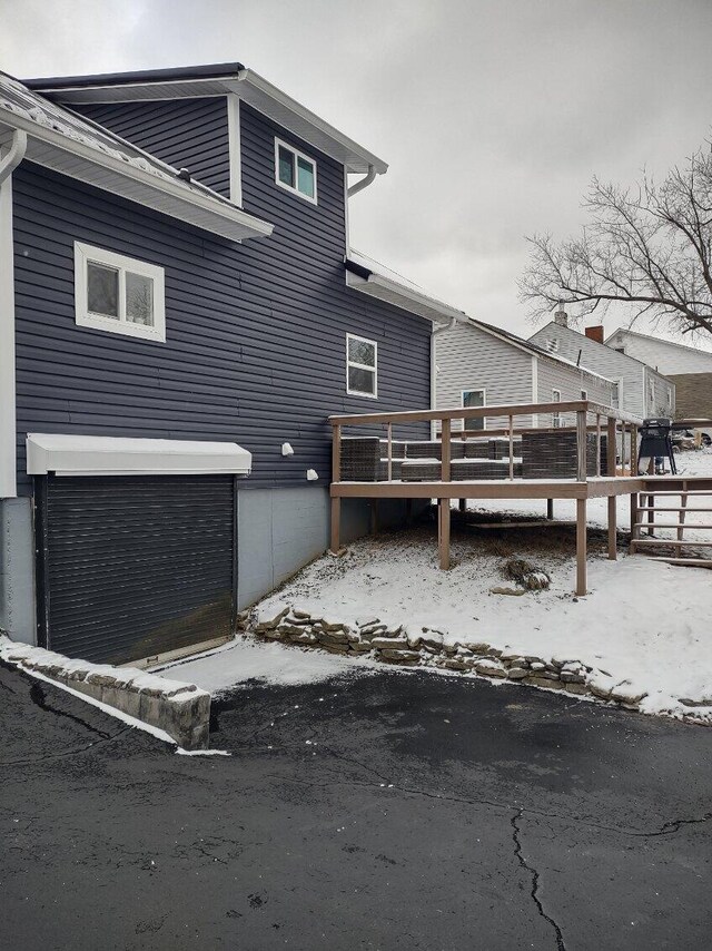 deck with a yard and area for grilling