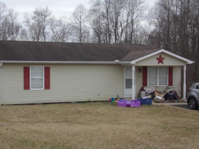 view of front of home with a front lawn