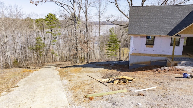 554 Colson Dr, Bronston, KY 42518 - view of home's exterior featuring a shingled roof
