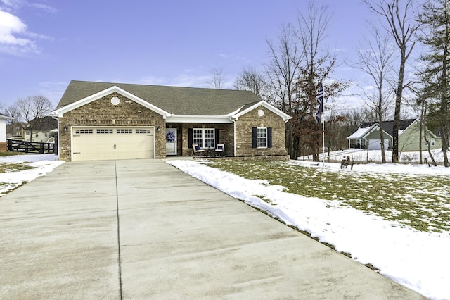 view of front of house with a shingled roof, brick siding, driveway, and an attached garage