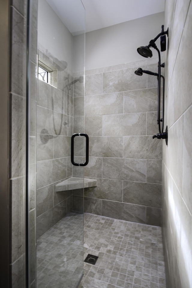 full bathroom with a stall shower