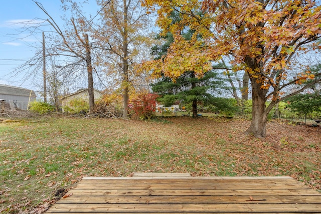 view of yard featuring a wooden deck