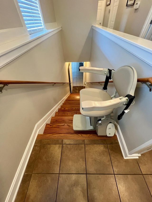 bathroom featuring tile patterned flooring and baseboards