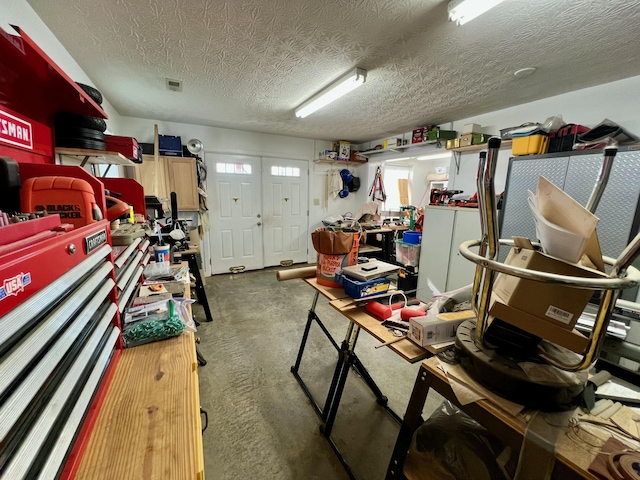 garage featuring visible vents