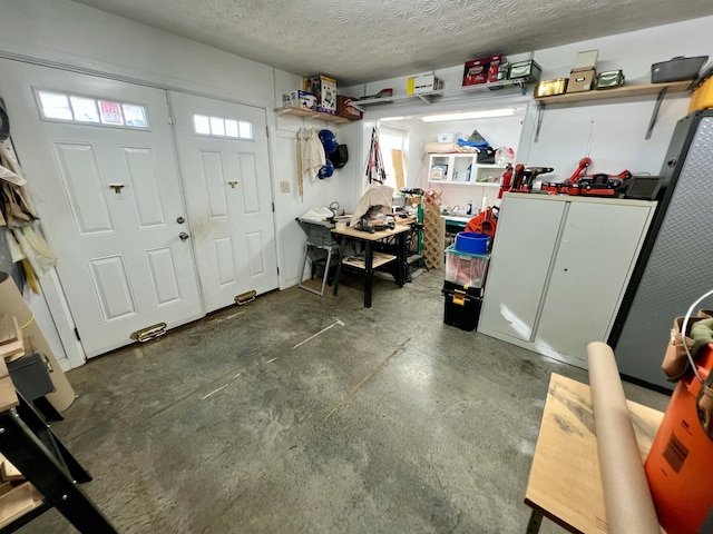 garage with a workshop area