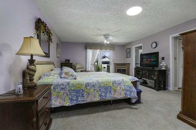 500 Patterson Rd, Versailles, KY 40383 - bedroom with carpet floors, a textured ceiling, a ceiling fan, and baseboards