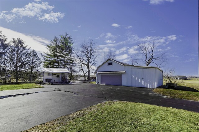 500 Patterson Rd, Versailles, KY 40383 - detached garage featuring asphalt driveway