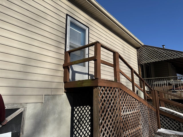 view of home's exterior featuring stairs