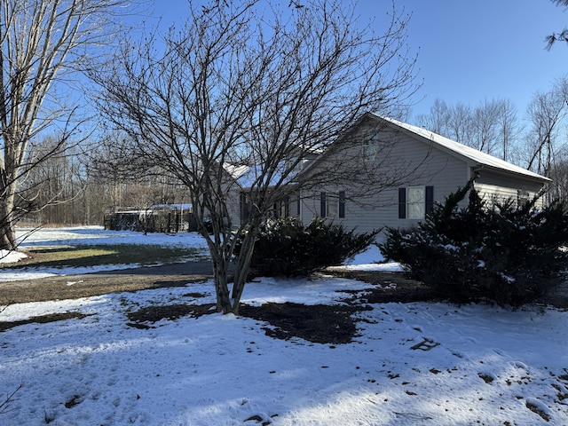 view of snow covered property