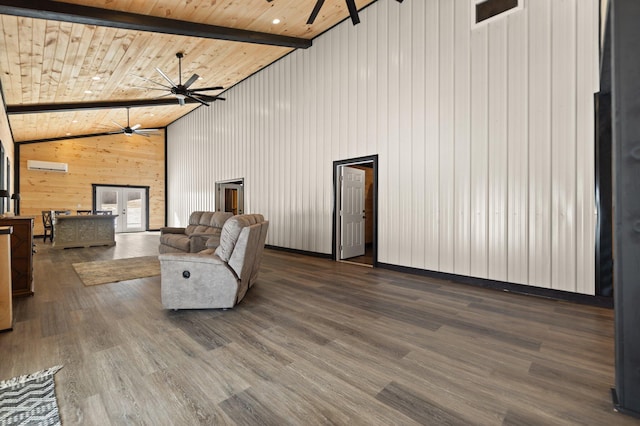 living area featuring ceiling fan, dark wood-style flooring, and beamed ceiling