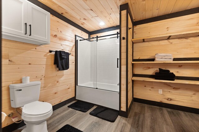 unfurnished room featuring ceiling fan, baseboards, wood finished floors, and french doors