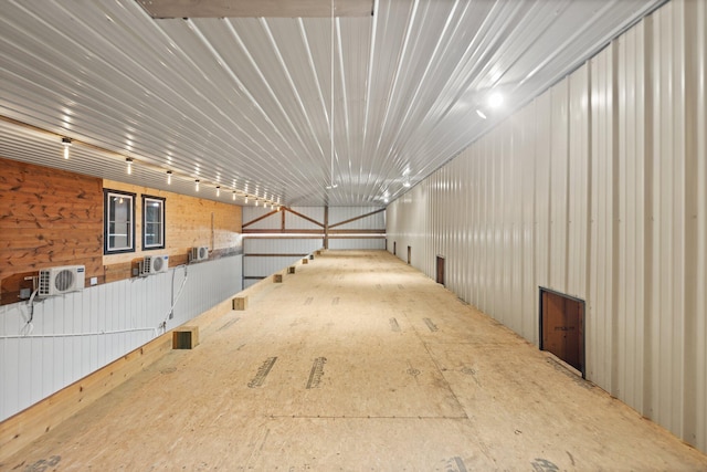 view of horse barn with ac unit