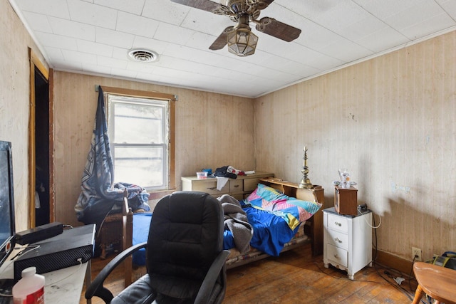 bedroom featuring dark wood-type flooring and visible vents