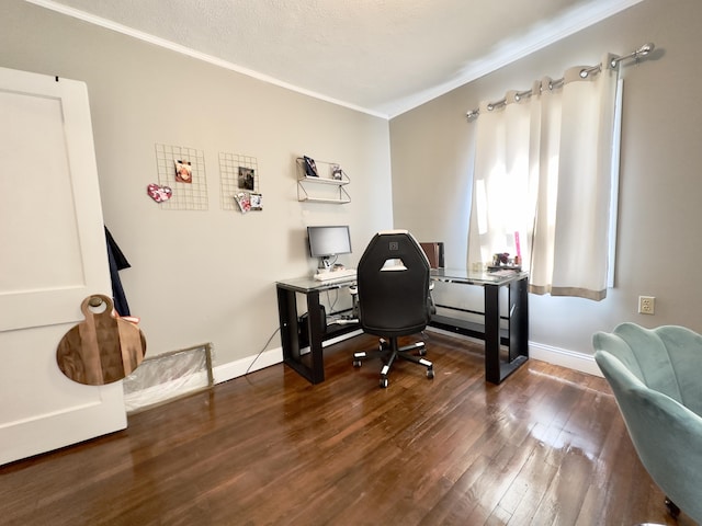 office area with crown molding, baseboards, and wood finished floors