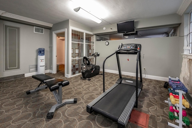 workout area with carpet, baseboards, and visible vents