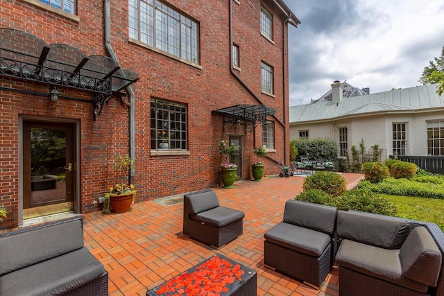 view of patio with an outdoor living space and a pergola