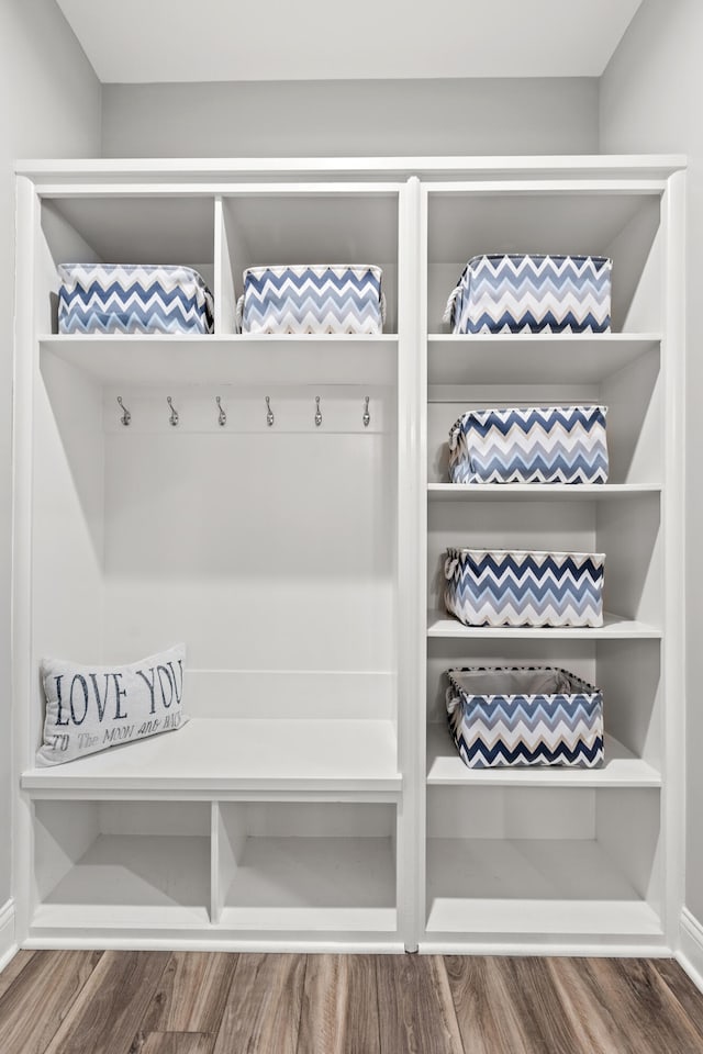 mudroom with wood finished floors