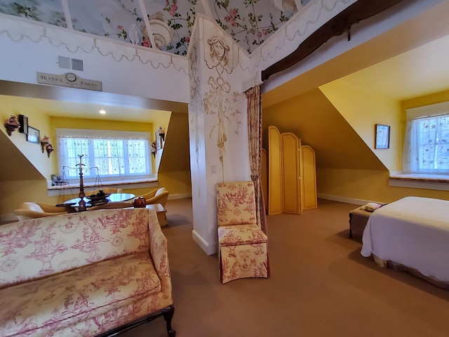 bedroom featuring carpet, visible vents, and baseboards