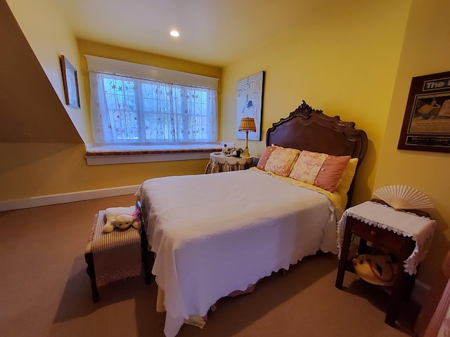 bedroom with carpet floors, baseboards, and recessed lighting