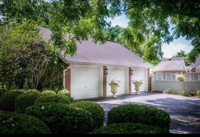 detached garage with fence