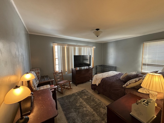 bedroom featuring carpet floors and crown molding