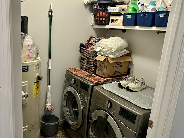 laundry room featuring washer and dryer, laundry area, and electric water heater