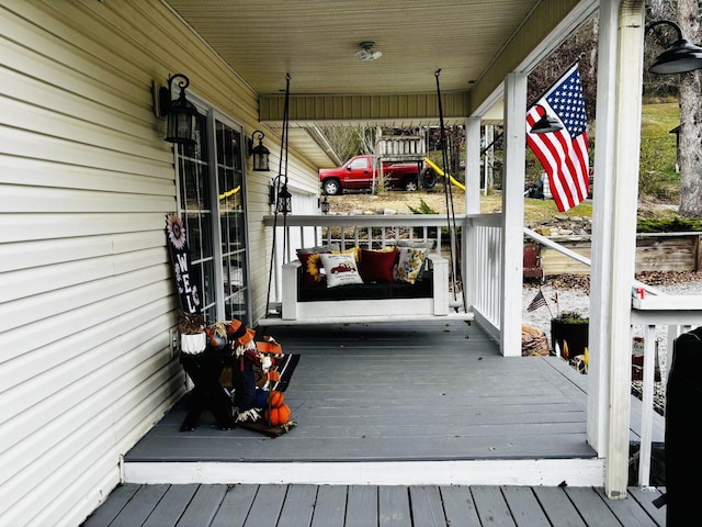 wooden terrace with covered porch