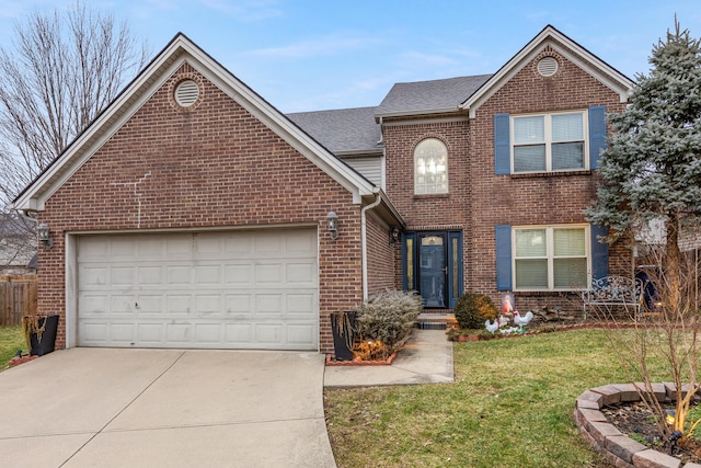 traditional-style house with an attached garage, a front lawn, concrete driveway, and brick siding