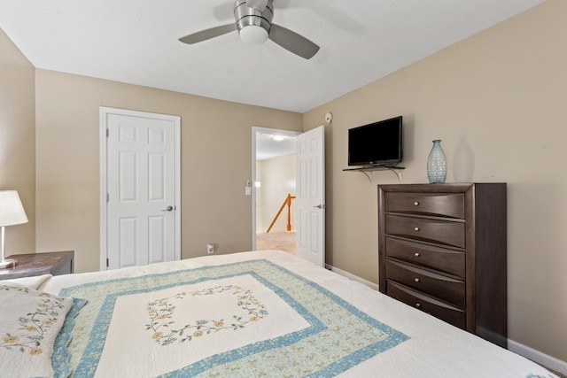 bedroom featuring ceiling fan, baseboards, and carpet flooring