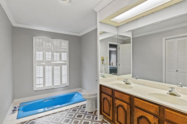 full bath featuring double vanity, ornamental molding, toilet, and a sink