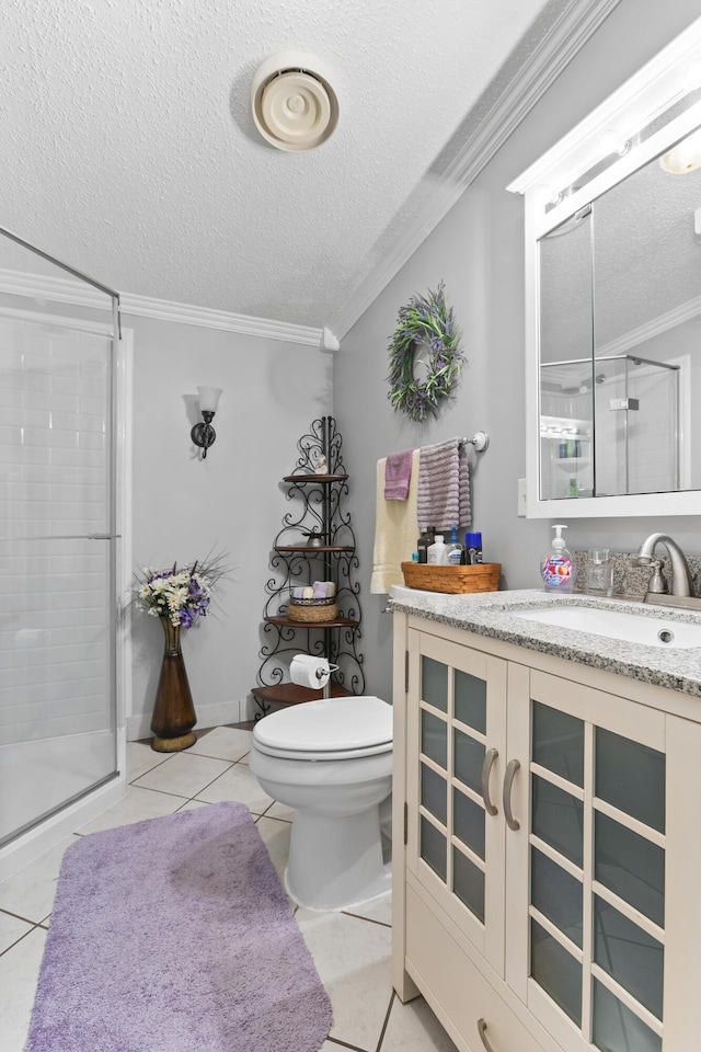 full bath featuring crown molding, toilet, a shower stall, vanity, and tile patterned flooring