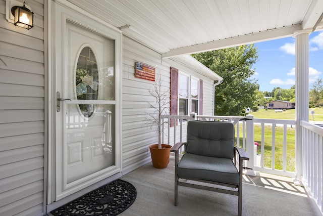 entrance to property with a porch