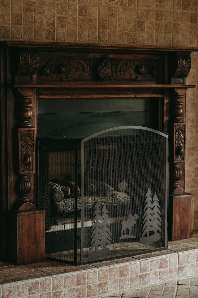 interior details featuring a fireplace