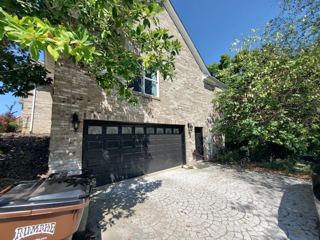 exterior space featuring brick siding