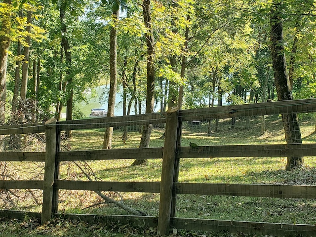 view of gate featuring fence