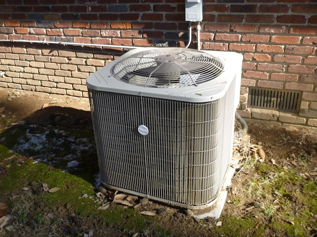 details with brick siding and central air condition unit