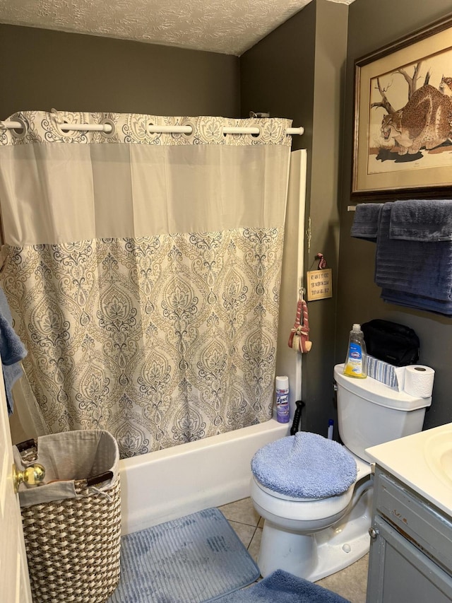 full bath with a textured ceiling, tile patterned flooring, toilet, vanity, and shower / bath combination with curtain