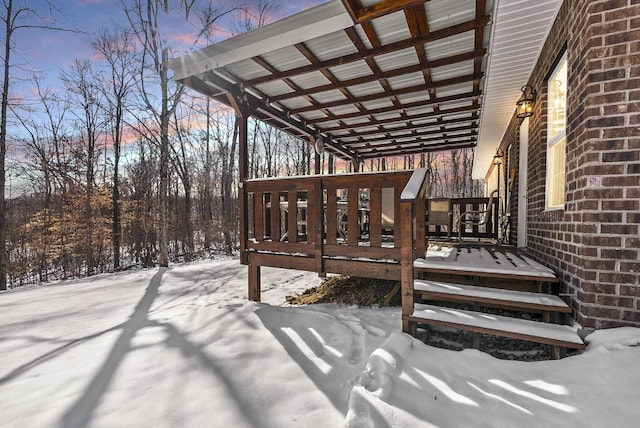 view of snow covered deck