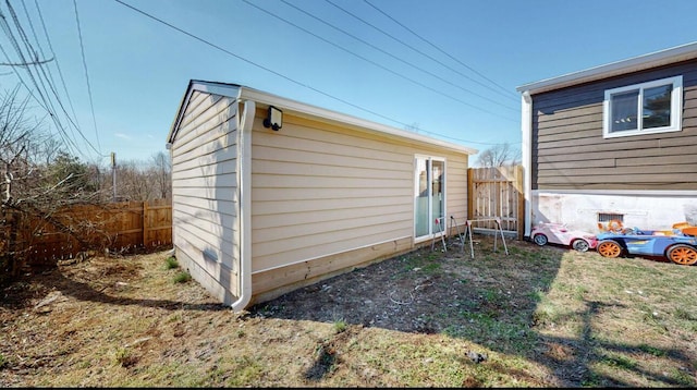 view of outdoor structure featuring an outdoor structure and fence