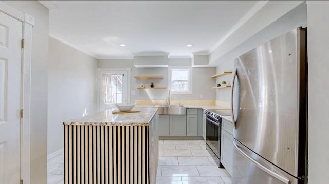 kitchen with open shelves, freestanding refrigerator, electric stove, marble finish floor, and a sink