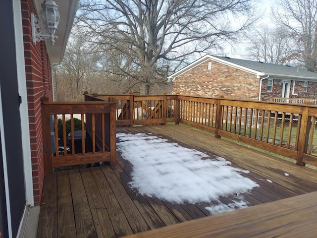 view of snow covered deck