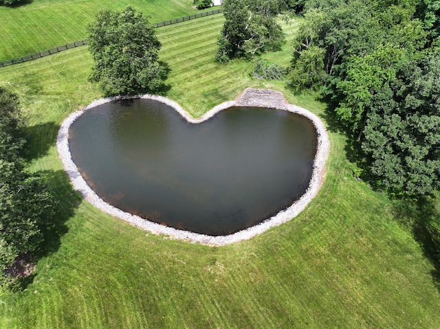 drone / aerial view featuring a rural view and a water view