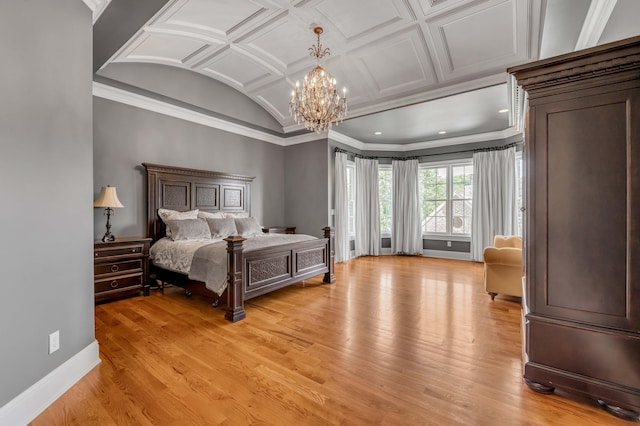 bedroom featuring light wood finished floors, baseboards, a chandelier, and crown molding