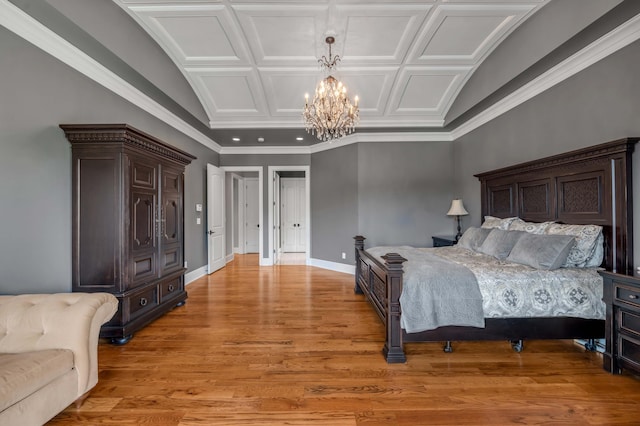 bedroom with a notable chandelier, coffered ceiling, baseboards, light wood-type flooring, and crown molding