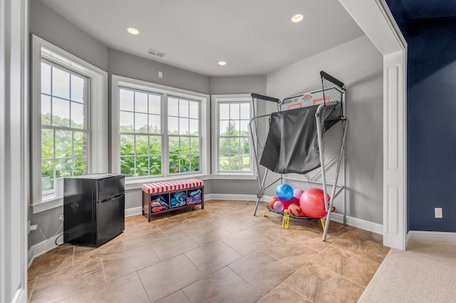 recreation room featuring visible vents, baseboards, and recessed lighting