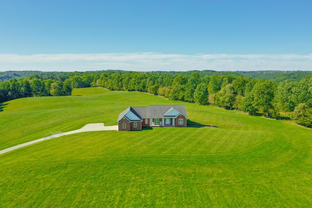 aerial view featuring a view of trees